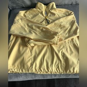 Size L Yellow Tommy Hilifiger quarter zip Windbreaker.